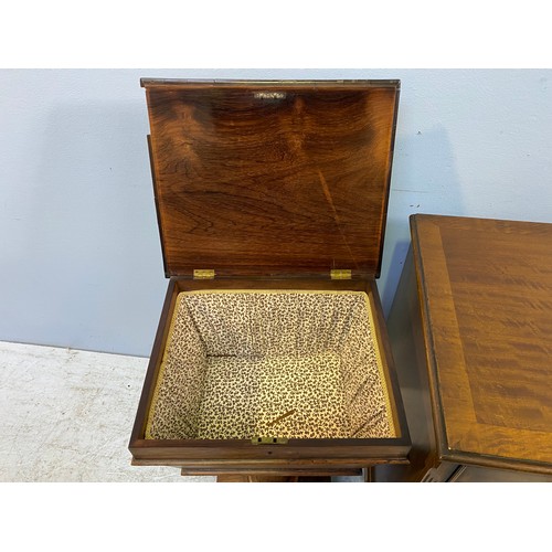 621 - A Victorian faded rosewood work table, raised on tapered column, circular base with four lions paw f... 