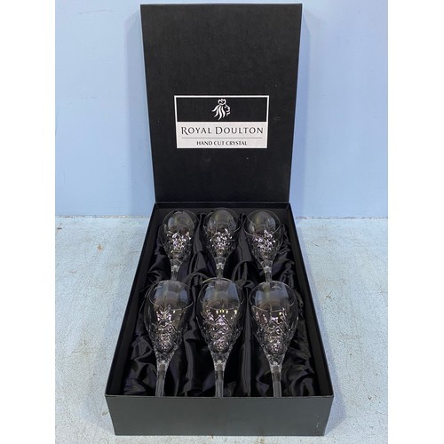 43 - A set of six Royal Doulton hand cut crystal wine glasses, boxed