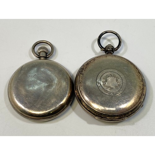 185 - A silver-cased open face pocket watch by Waltham, the white enamel dial with Roman numerals denoting... 