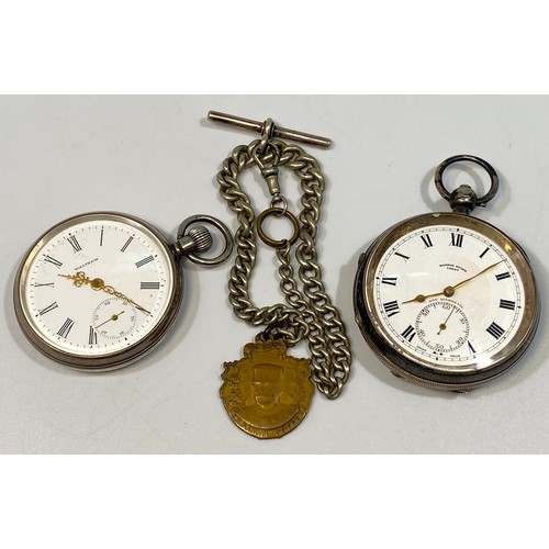 185 - A silver-cased open face pocket watch by Waltham, the white enamel dial with Roman numerals denoting... 