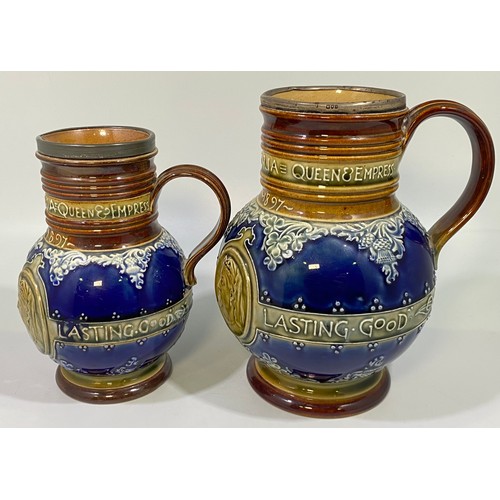 47 - Two Doulton Lambeth stoneware bulbous jugs, both commemorating 60 years of Queen Victoria on the thr... 