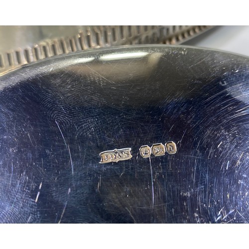 163 - A pair of late 19th century 'Adam Revival' silver bon-bon dishes of oval form with beaded rims, pier... 