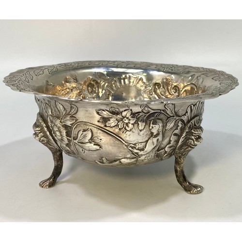 164 - A George III Irish silver sugar bowl or bon-bon of circular form with everted rim, embossed and chas... 