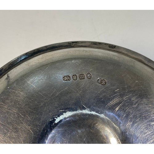 158 - A George III Silver chamberstick, of Neo-classical design, with vase sconce and reeded rims, London,... 