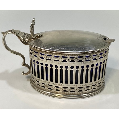 160 - A George III silver Mustard in Neo-Classical style, of oval form with hinged cover, bright-cut decor... 