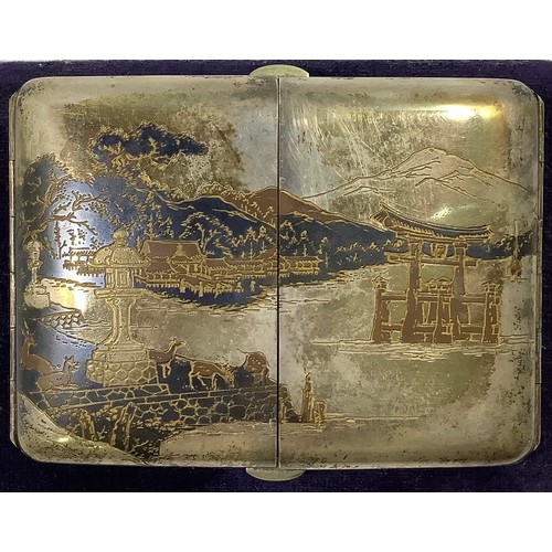 113 - A Japanese silver and niello worked cigarette case with double flip out front, engraved inside and o... 