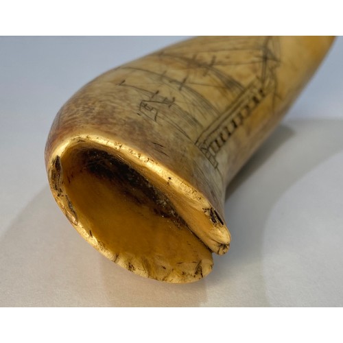 513 - A whale tooth scrimshaw carved with a three-masted man of war and a five-masted ship, initialled and... 