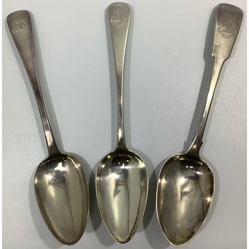 153 - Three Georgian silver old English and fiddle pattern serving spoons, including one by William Woodma... 