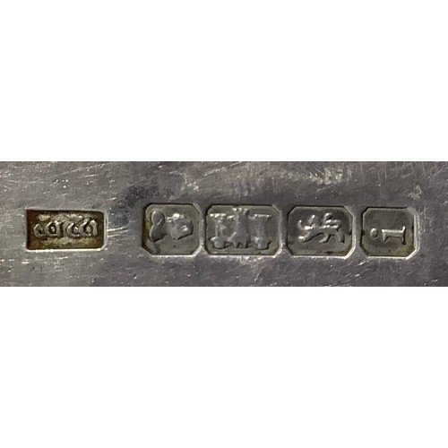 153 - Three Georgian silver old English and fiddle pattern serving spoons, including one by William Woodma... 