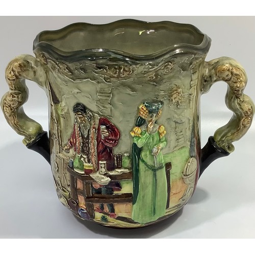 5 - A Royal Doulton twin-handled jug / loving cup decorated as 'The Apothecary' designed by Charles Noke... 