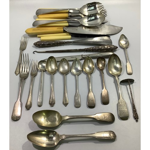 156 - A mixed collection of assorted Georgian, Victorian and later silver flatware including spoons and fo... 