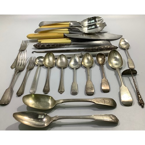 156 - A mixed collection of assorted Georgian, Victorian and later silver flatware including spoons and fo... 
