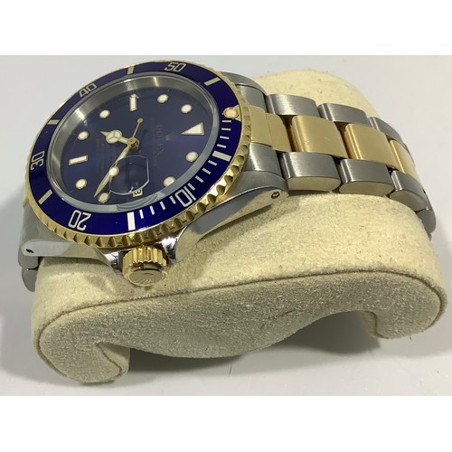 167 - A gents Rolex stainless steel and 18ct yellow gold ‘Rolesor’ Submariner wristwatch, model 16613, C.1... 