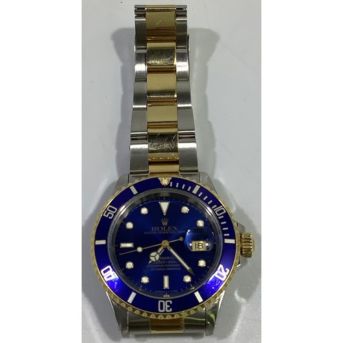 167 - A gents Rolex stainless steel and 18ct yellow gold ‘Rolesor’ Submariner wristwatch, model 16613, C.1... 