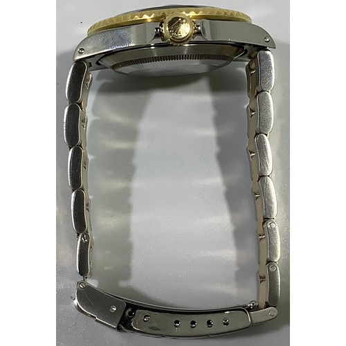 167 - A gents Rolex stainless steel and 18ct yellow gold ‘Rolesor’ Submariner wristwatch, model 16613, C.1... 