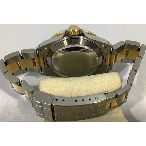 167 - A gents Rolex stainless steel and 18ct yellow gold ‘Rolesor’ Submariner wristwatch, model 16613, C.1... 