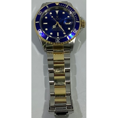 167 - A gents Rolex stainless steel and 18ct yellow gold ‘Rolesor’ Submariner wristwatch, model 16613, C.1... 