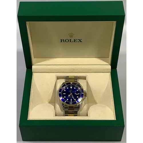 167 - A gents Rolex stainless steel and 18ct yellow gold ‘Rolesor’ Submariner wristwatch, model 16613, C.1... 