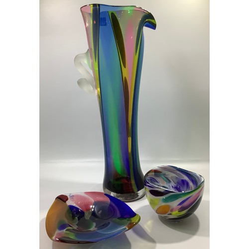 32 - A large Will Shakspeare glass stylised jug with tapered multi-coloured body and applied opaque glass... 