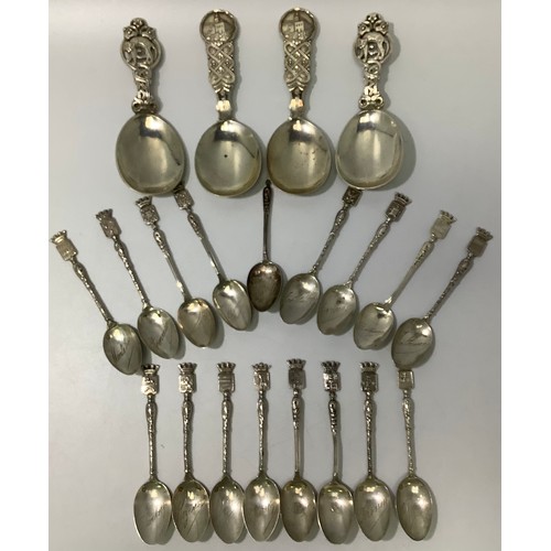 144 - A collection of assorted French .800 grade or above silver topographical teaspoons, together with fo... 