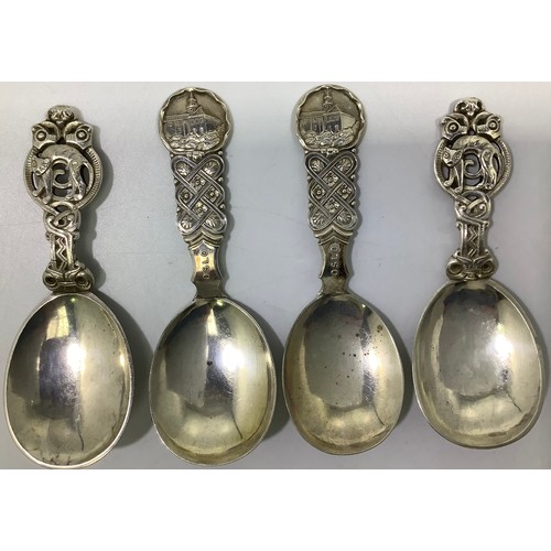 144 - A collection of assorted French .800 grade or above silver topographical teaspoons, together with fo... 