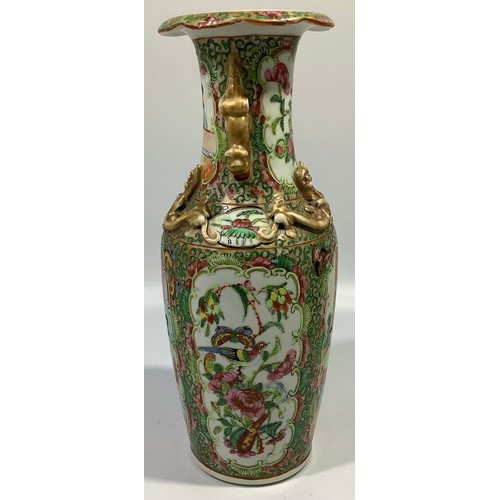 91 - A 19th century canton enamel famille rose vase with panels of scholars, birds and flowers, applied g... 