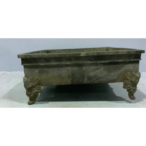 96 - A Chinese cast metal shallow planter / trough with applied dragons (one foot af)