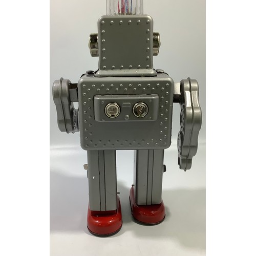 A Haha Toy battery operated Smoking Spaceman toy robot, boxed