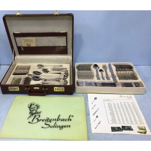 169 - A stainless steel and gold-plated Breitenbach ‘Athena’ two-tier canteen of cutlery including knives,... 