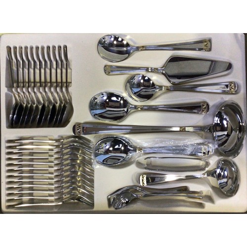 169 - A stainless steel and gold-plated Breitenbach ‘Athena’ two-tier canteen of cutlery including knives,... 