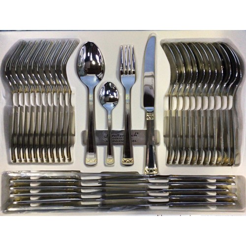 169 - A stainless steel and gold-plated Breitenbach ‘Athena’ two-tier canteen of cutlery including knives,... 