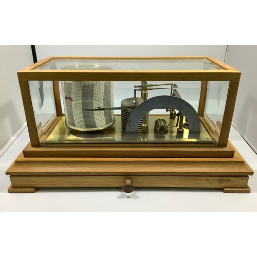 376 - A ‘Regent Barograph’ by Negretti & Zambra’, with brushed brass base and engraved plaque, housed in l... 