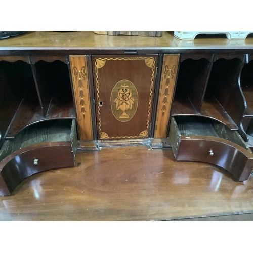 620 - A George III mahogany bureau with fall-front enclosing compartments, pigeon holes and secret compart... 