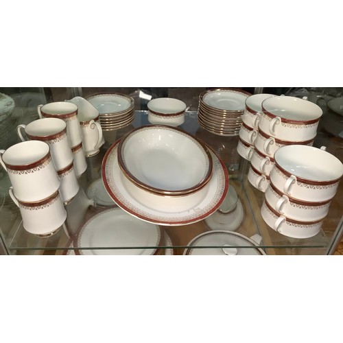 14 - A Paragon ‘Holyrood’ pattern part tea and dinner service with red and gilt rims comprising one turee... 