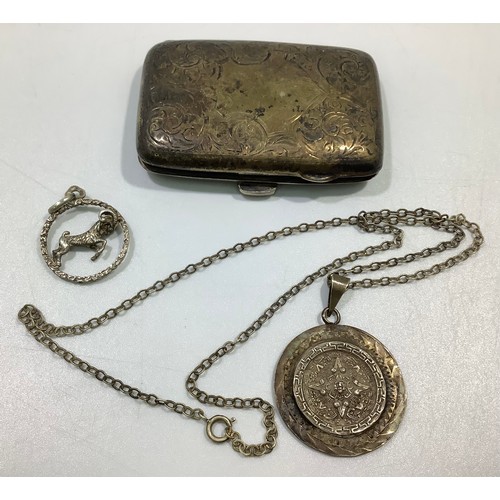 166 - A small silver cigarette case hallmarked for Birmingham, together with an Aries ram necklace pendant... 