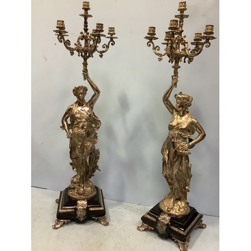 168 - An imposing pair of silvered metal six-light candelabra after Jean-Louis Gregoire, modelled as Venus... 
