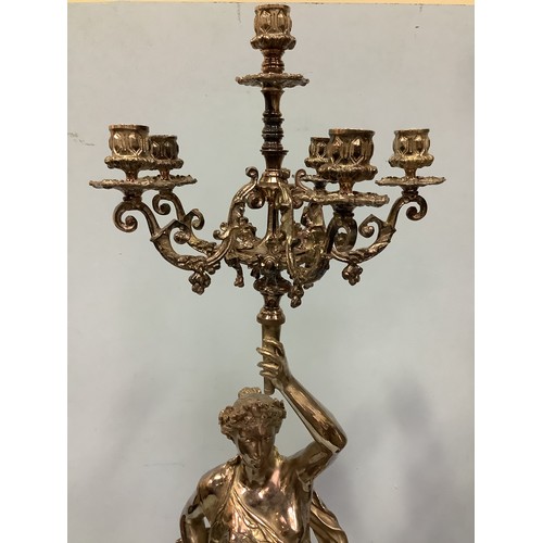168 - An imposing pair of silvered metal six-light candelabra after Jean-Louis Gregoire, modelled as Venus... 