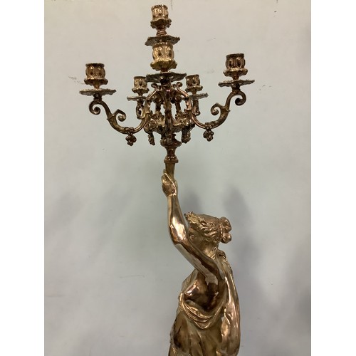 168 - An imposing pair of silvered metal six-light candelabra after Jean-Louis Gregoire, modelled as Venus... 