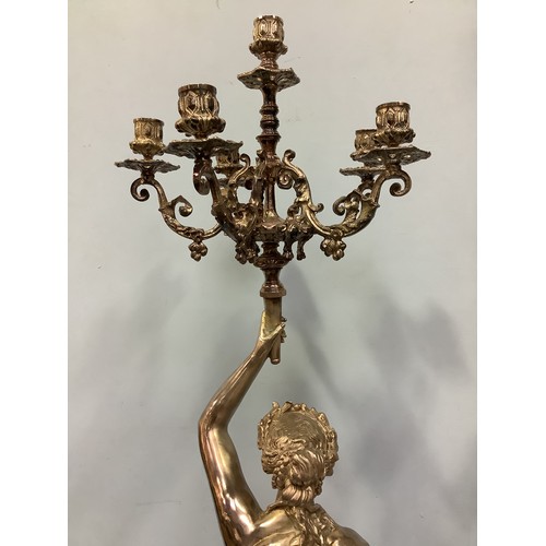 168 - An imposing pair of silvered metal six-light candelabra after Jean-Louis Gregoire, modelled as Venus... 