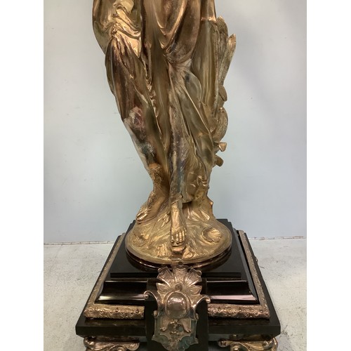 168 - An imposing pair of silvered metal six-light candelabra after Jean-Louis Gregoire, modelled as Venus... 