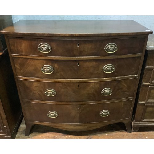 632 - A 19th century mahogany bow-front chest of four long, graduated drawers, with brass pulls and flushe... 