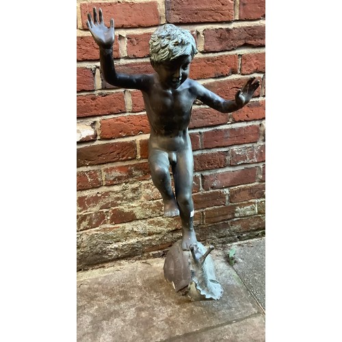 401 - A late 19th / early 20th century copper fountain modelled as a figure of a young boy balancing on a ... 