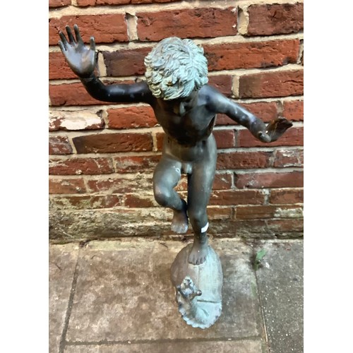 401 - A late 19th / early 20th century copper fountain modelled as a figure of a young boy balancing on a ... 