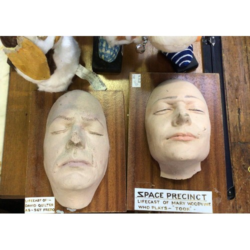 408 - A large and varied mix of movie home made prop memorabilia including two lifecast Space Precinct act... 