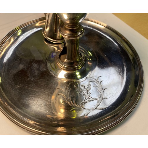 158 - A George III Silver chamberstick, of Neo-classical design, with vase sconce and reeded rims, London,... 