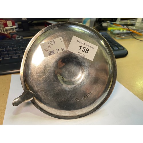 158 - A George III Silver chamberstick, of Neo-classical design, with vase sconce and reeded rims, London,... 