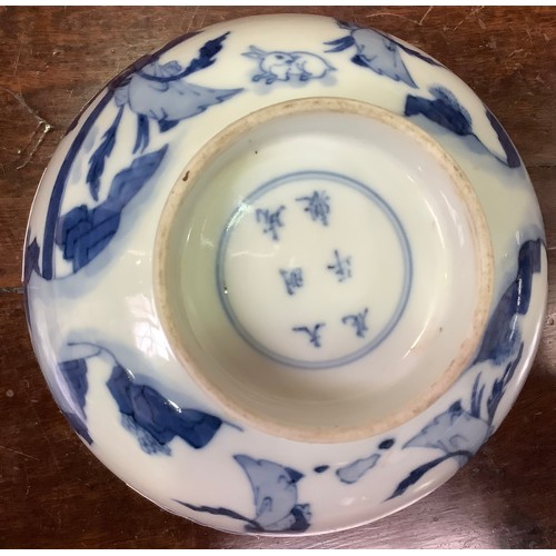 95 - A Chinese porcelain blue and white bowl decorated with ladies in a walled garden with a rabbit, Chen... 