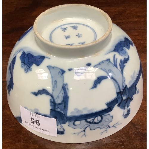 95 - A Chinese porcelain blue and white bowl decorated with ladies in a walled garden with a rabbit, Chen... 