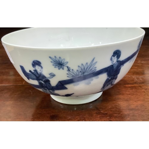 95 - A Chinese porcelain blue and white bowl decorated with ladies in a walled garden with a rabbit, Chen... 