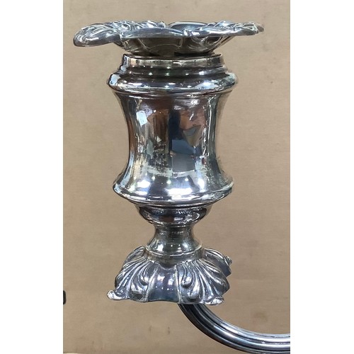 108 - A matching silver candelabrum suite by Walker & Hall, comprising three-light candelabrum and two can... 